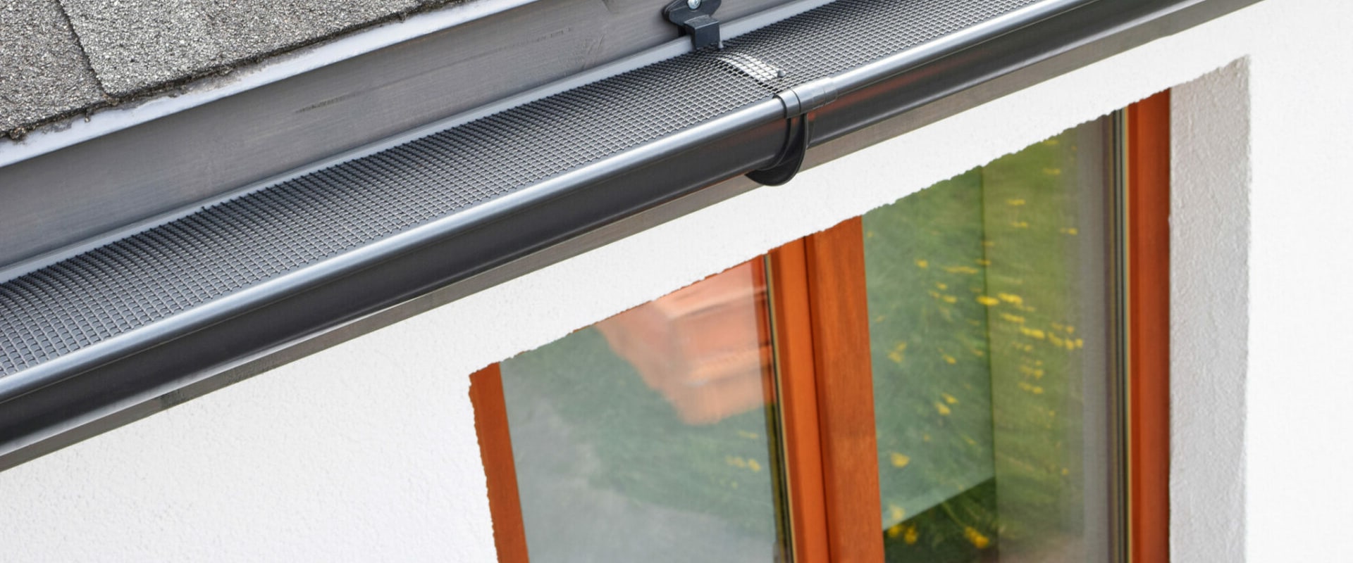 The Importance of Gutter Guards for Masonry and Roofing Services